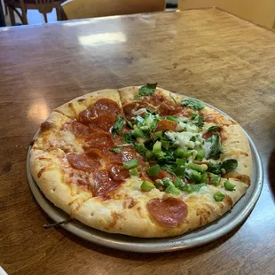 Small pepperoni pizza w/ green peppers and spinach.