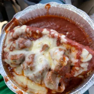 a pizza in a foil container