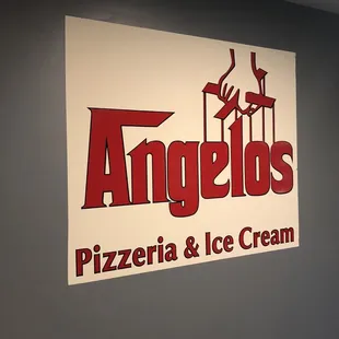 a pizza and ice cream sign