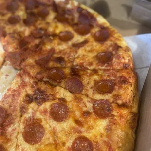 two slices of pepperoni pizza