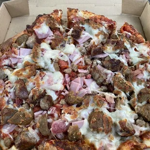 Medium meat lovers pizza