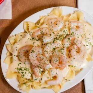 a plate of pasta and shrimp