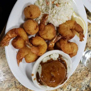 Jumbo shrimp with mashed potatoes.