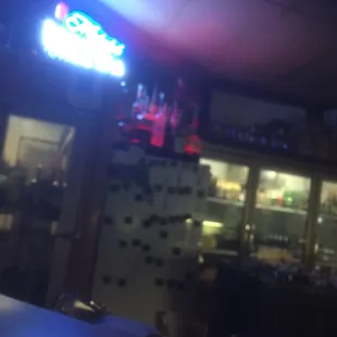 a bar with a neon sign