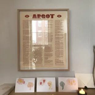 a table with cards and a lit candle