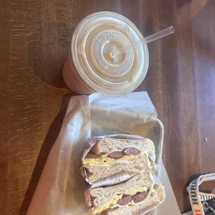 Sausage egg and cheese on ciabatta and caramel latte with almond milk.