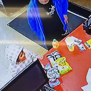 These 2 kids live at the campground with their mom and heres a picture of them using my debit card.