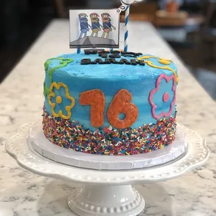 a cake decorated with sprinkles