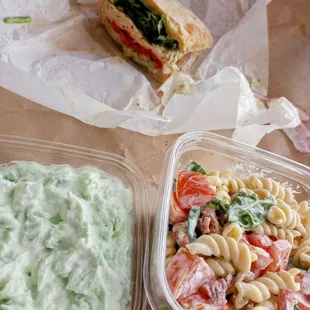 a sandwich and pasta salad