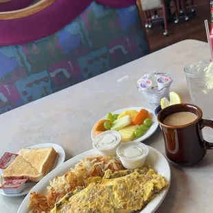 Gyro omelette, fruit, hash browns, toast