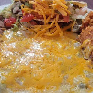 2 enchiladas, rice and beans and taco