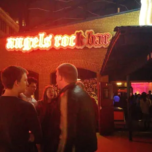 a group of people standing outside