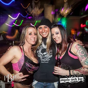 three women posing for a picture