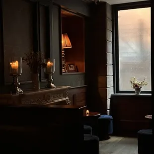 a living room with a view of the city
