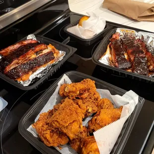 three trays of fried chicken