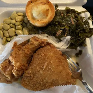 Fried chicken, greens, lima beans, and a corn muffin.