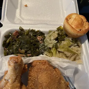 Fried chicken, cabbage, greens, and a corn muffin.