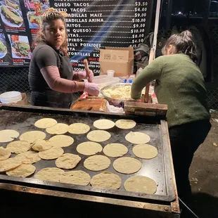 The lovely ladies making fresh tacos