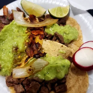 2 Carne asada and 1 pastor a la plancha $2.50 each