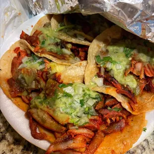Al pastor tacos with everything