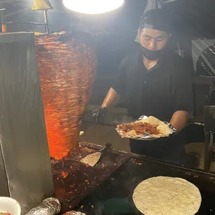 a man preparing food