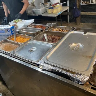 a group of people preparing food