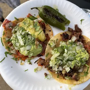 Tacos de asada y pastor.... Too salty in my opinion. Not worth the wait or price