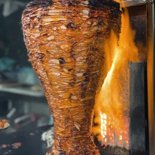 a skewer being cooked