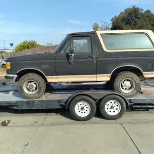 1990 Ford Bronco being trailered