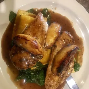 This is chicken apple-jack, cooked apples &amp; On bed of spinach it was really different and very good‼