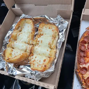 two pizzas in a box