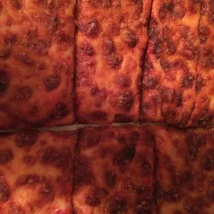 Overcooked cheese pizza.