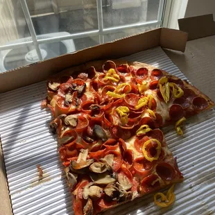 Large pepperoni pizza. 1/2 mushrooms, 1/2 banana peppers