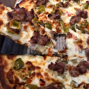 a sliced pizza in a box