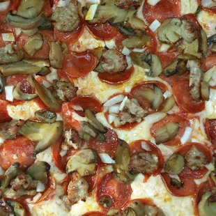 Sausage, Pepperoni, Onion, Mushroom Pizza from Anges