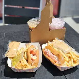 Left: Cold lobster meal Left back: Cold brew with half and half and sugar Right: Cold snow crab meal Right back: berry and cream