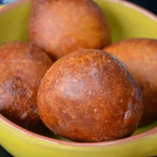 a bowl full of doughnuts