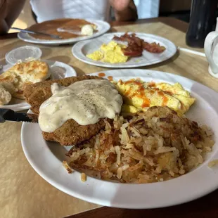 Chicken fried steak... (hot sauce on my eggs)
