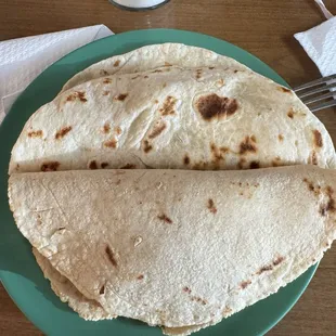 Corn tortilla with chicharron in salsa. Delish! And bean and bacon in flour tortilla.