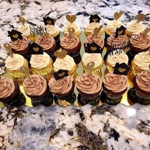 Housewarming cupcakes. 1 dozen white cake and 1 dozen chocolate.