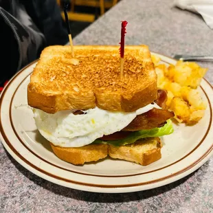 a bacon, egg, and lettuce sandwich