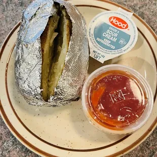 Baked potato that came with Fisherman&apos;s Platter