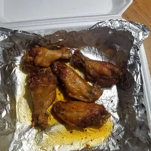 Half of a 10 piece order of the sweet chili wings. Oysters disappeared quickly once i got home.