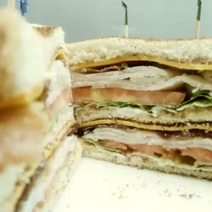 Triple decker Turkey club loaded with Bacon, Shaved Turkey, and a whole bunch of yummyness.