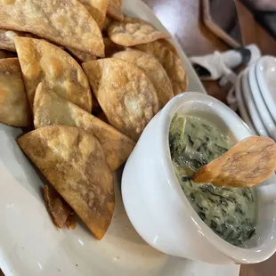 Spinach artichoke dip with freshly made pita chips! Kinda cheesy and good!