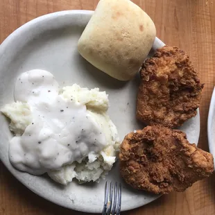 Fried pork chops with mashed potato&apos;s and cream gravy.