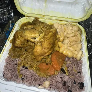 Curry Chicken with Mac and Cheese and rice and peas