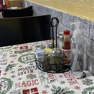 a table with a variety of condiments