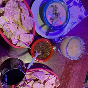 Lots of crispy chips with our Chile con queso con guacamole