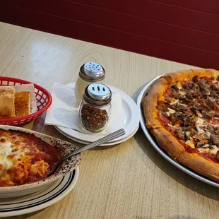 XL 3 topping pizza, lasagna,  garlic bread, two cokes for $45.